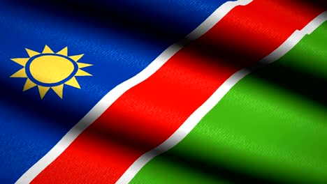 Namibia-Flag-Waving-Textile-Textured-Background.-Seamless-Loop-Animation.-Full-Screen.-Slow-motion.-4K-Video