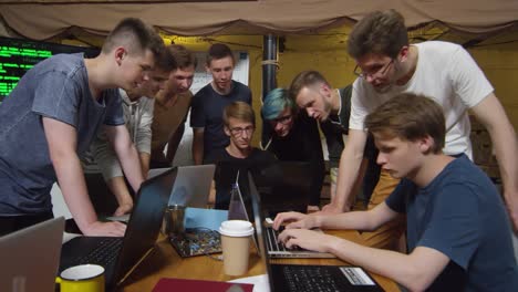 Young-Men-Talking-at-Programming-Workshop