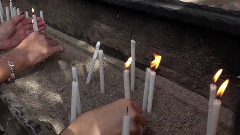 Ultra-slow-motion---Candles-that-burn-for-workship-at-church