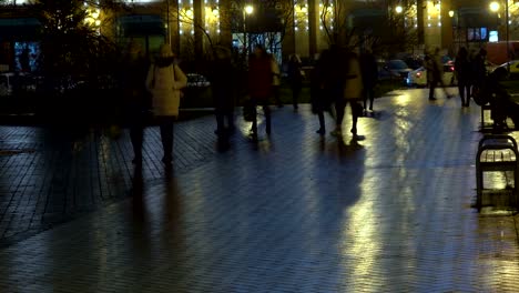 Anonymous-people-walking-at--in-the-night-city.--Time-lapse.-Kaliningrad---November-2017-Russian.