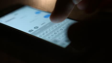 Fingers-typing-a-message-on-the-smartphone.-Close-up