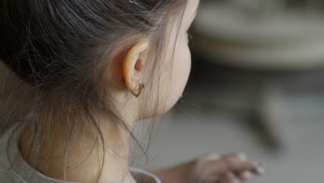 Adorable-Little-Girl-Playing-with-Clay