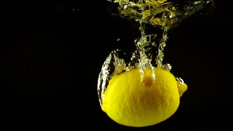 Falling-of-a-lemon-in-water.-Slow-motion.