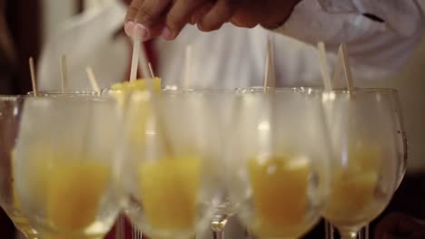 several-glasses-of-champagne-with-yellow-popsicle-ice-cream