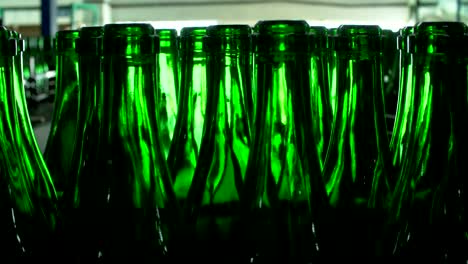 Champagne-bottles-on-factory-conveyor-belt