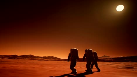 Three-astronauts-in-spacesuits-explore-the-planet-Mars