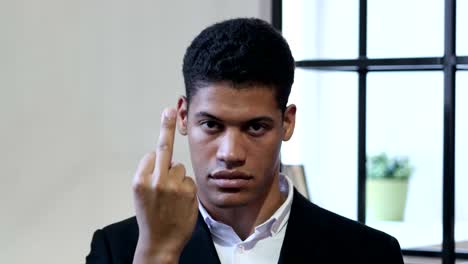 Showing-Middle-Finger,-Black-Businessman