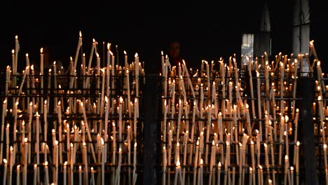 Big-candlestick-with-candles-and-people