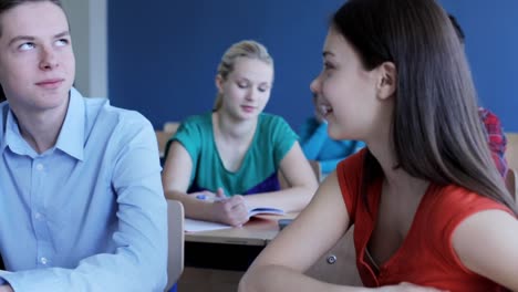 happy-students-talking-on-lesson-at-school