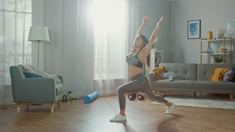 Schöne-zuversichtlich-Busty-Fitness-Mädchen-in-einem-sportlichen-Top-ist-tun-Stretching-Yoga-Übungen-in-ihr-helle-und-geräumige-Wohnung-mit-minimalistisches-Interieur.