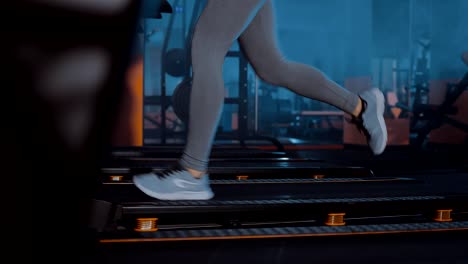 Running-on-the-track.-Legs-in-sneakers.-Close-up