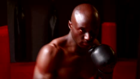 Man-boxing-at-gym-gym