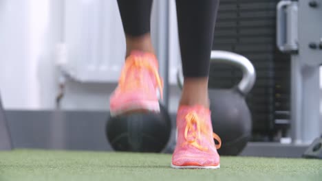 Feet-of-a-woman-jumping-rope-at-a-gym