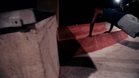 Crop-shot-of-Afro-american-busy-doing-pushups