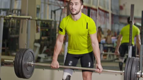 Sportsman-with-Impairment-Working-Out-with-Barbell