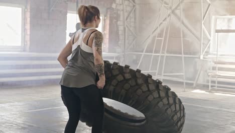 Muscular-Woman-Flipping-Tire
