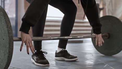 Female-Athlete-Doing-Reverse-Grip-Barbell-Curl