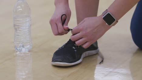 Closeup-shot-of-shoe-being-tied-at-gym