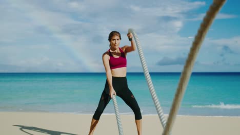 Woman-Exercising-with-Battle-Ropes