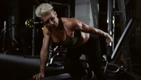 Female-Athlete-Doing-Bent-Over-Dumbbell-Curls