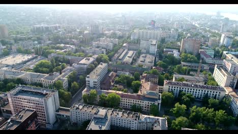 Panoramic-view-of-the-old-town-near-the-river,-a-Soviet-built-city-near-the-river-from-the-air