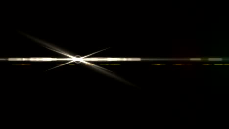 Abstract-lens-flare-light-over-black-background.sun-burst-on-black-background-motion.Open-light-scene