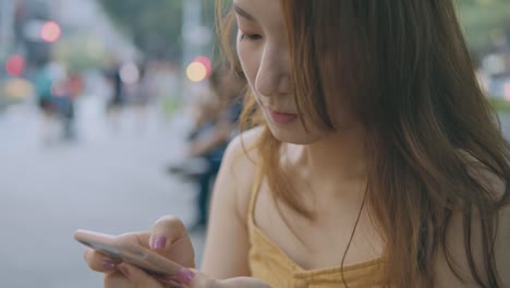 Young-Woman-Use-Of-Mobile-Phone