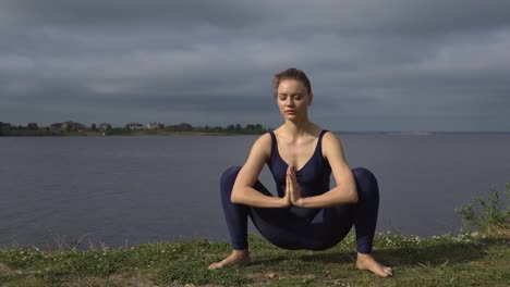 Woman-in-classical-yoga-pose,-energy-concentration