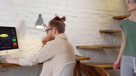 Girlfriend-Hugging-Boyfriend-Working-from-Home