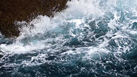 Detail-of-rocks-and-waves.Slow-motion.