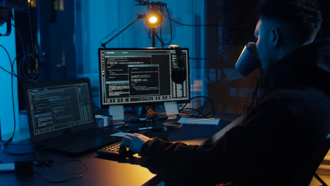 hacker-using-computer-for-cyber-attack-at-night