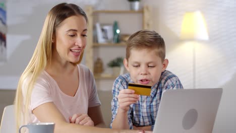 Mother-and-Son-Making-Online-Payment
