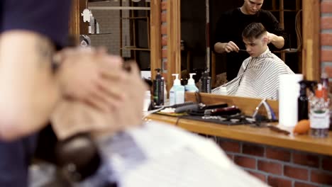 Professional-stylists-works-in-barbershop