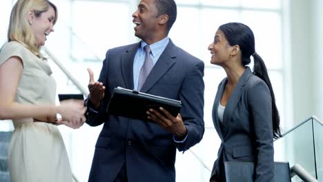 Male-female-multi-ethnic-business-team-in-office