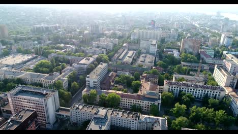 Modern-buildings-on-the-background-of-the-old-city,-top-view