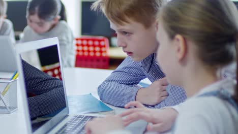 Boy-and-Girl-Looking-at-Computer-Screen