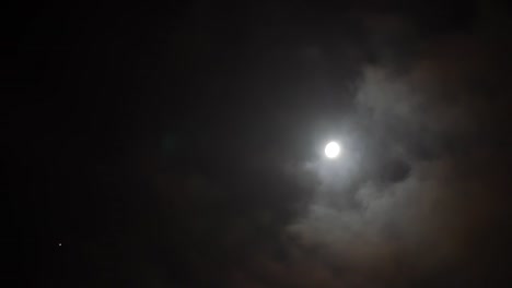 moving-clouds-with-the-moon-in-the-background