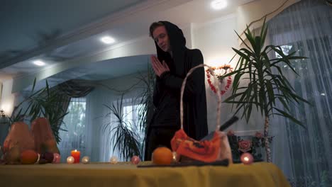 Halloween.-Guy-in-the-black-overalls-comes-to-the-festive-table.