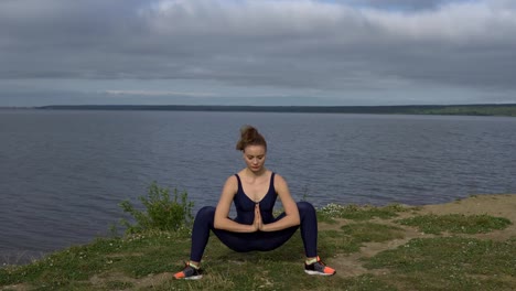 Woman-in-classical-yoga-pose,-energy-concentration