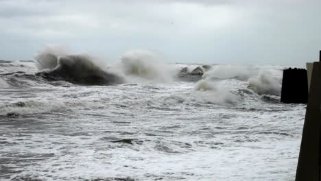 High-wave-breaking-on-the-rocks-of-the-coastline.-Extremely-Big-Wave-crushing-coast-,-Large-Ocean-Beautiful-Wave.-Super-Slow-Motion.