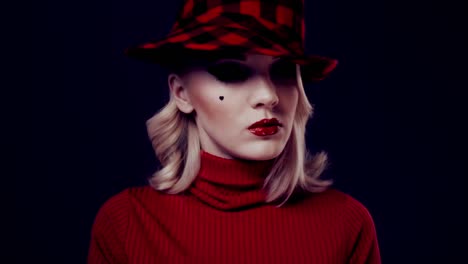 Woman-in-red-hat-with-red-lips.