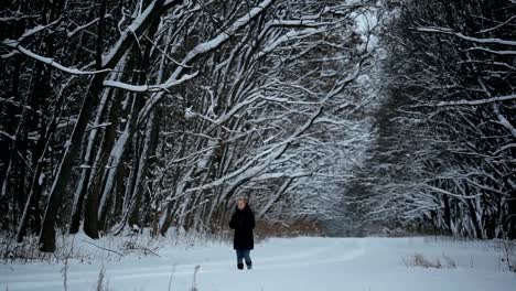 Young-Woman-Lost-Its-Way-in-the-Woods-in-Winter.