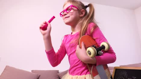 Funny-girl-with-magic-wand-and-skateboard