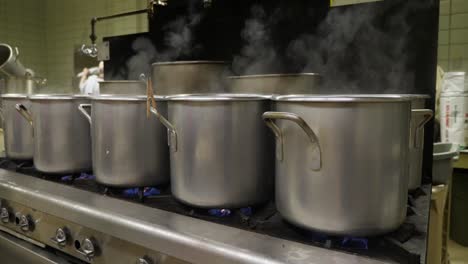 Pots-on-a-Stove-in-an-Industrial-Kitchen