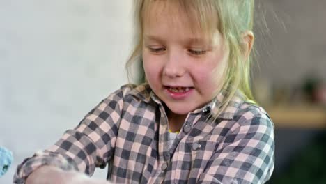 Hands-of-Little-Girl-Playing-with-Flour