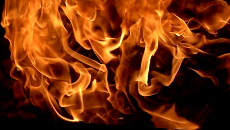 Flames-of-fire-on-black-background-in-slow-motion