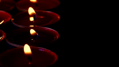 Passing-Rows-Of-Candles-In-Catholic-Church