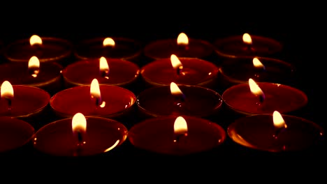 Passing-Red-Candles-On-Stand