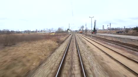 Railroad-track-running-through-coutry-landscapes