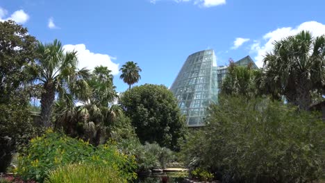 Low-Angle-Video-of-Cone-Shape-Glass-Greenhouse-Walking-Towards-It